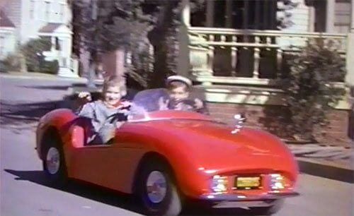 Joanna and Chris drive their personal Autopia car around the Disney Backlot. Copyright Disney Enterprises, Inc. All rights reserved