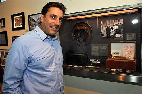 Walter Elias Disney Miller with some of Walt's personal effects that he helped unpack at the Walt Disney Family Museum. Photo courtesy of the Walt Disney Family Foundation.