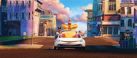 Characters from Cloudy with a Chance of Meatballs enjoy a ride down the street