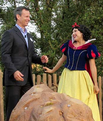 Thom Staggs and Snow White open up New Fantasyland at Walt Disney World in Orlando Florida