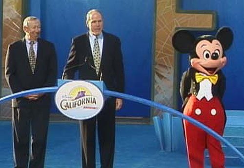 Roy E. Disney, Michael Eisner and Mickey Mouse at the grand opening of DCA 2001