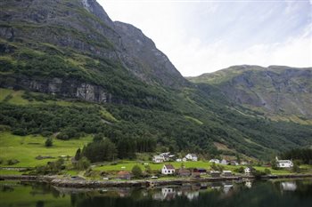 A town nestled in the green Fjords of Norway