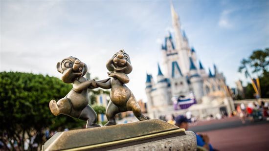 Chip and Dale, immortalized in bronze in front of Cinderella Castle in Walt Disney World